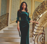 Bell Sleeve Off Shoulder Stretch Velvet Rosette Gown In Hunter